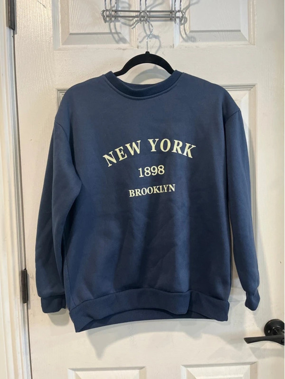 Woman’s blue "New York Brooklyn 1898" crewneck sweatshirt sweater